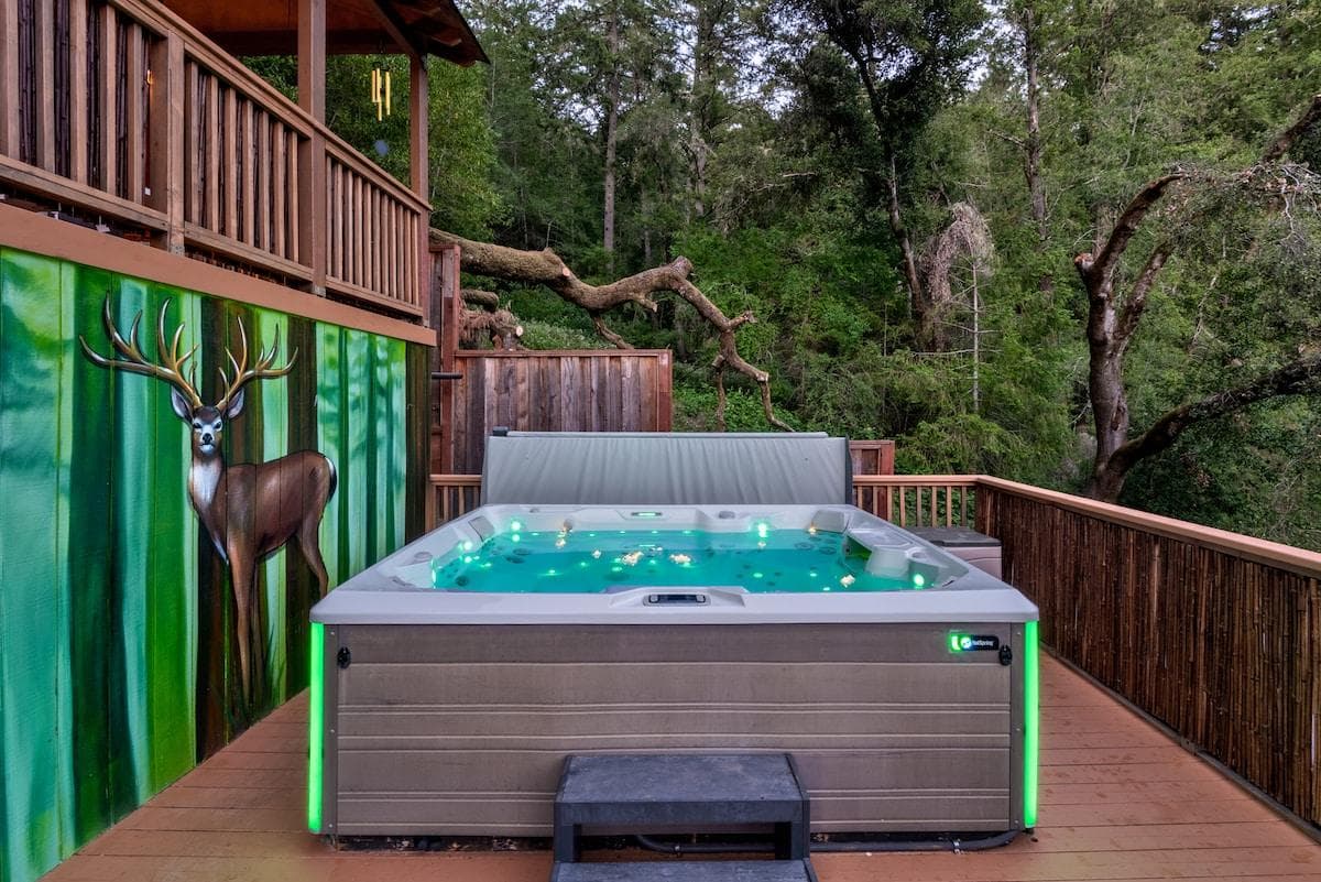 [Deck] 73-jet Hot Spring Limelight Prism® hot tub under the stars—your private spa escape in nature
